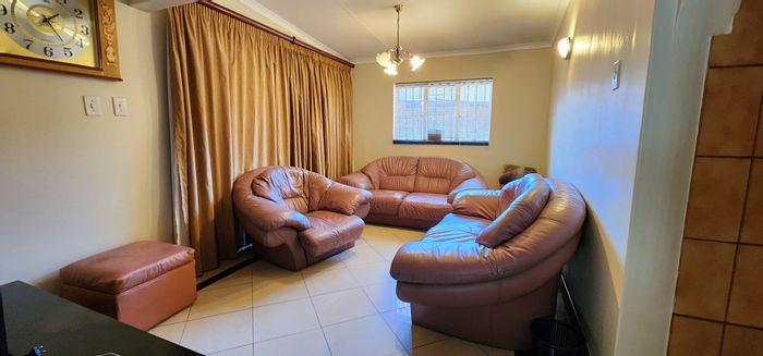 For Sale: Spacious Laudium house with flatlet, jacuzzi, and secure patio.