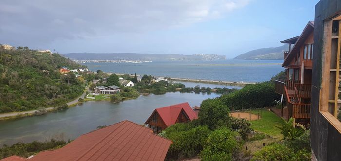 Kanonkop House For Sale: Three apartments, lagoon views, private decks, versatile living.