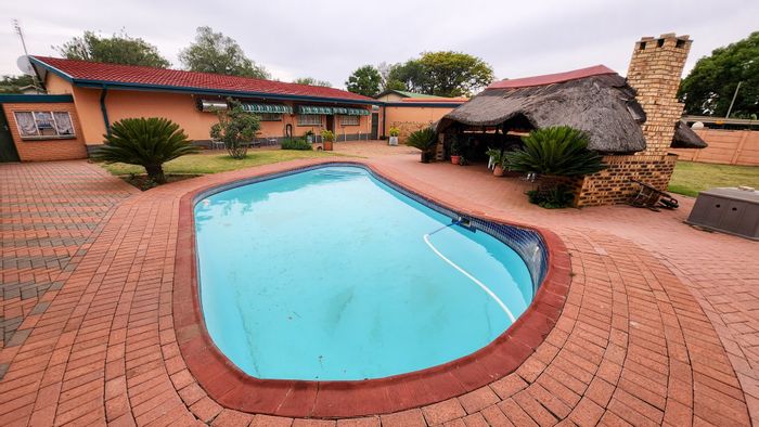 For Sale: House in Stilfontein Ext 4 with pool, lapa, and garage.