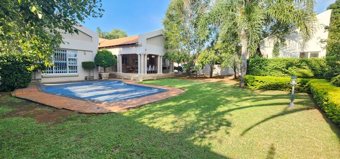 Erasmia House For Sale: Spacious layout, pool, braai area, and in-house office.