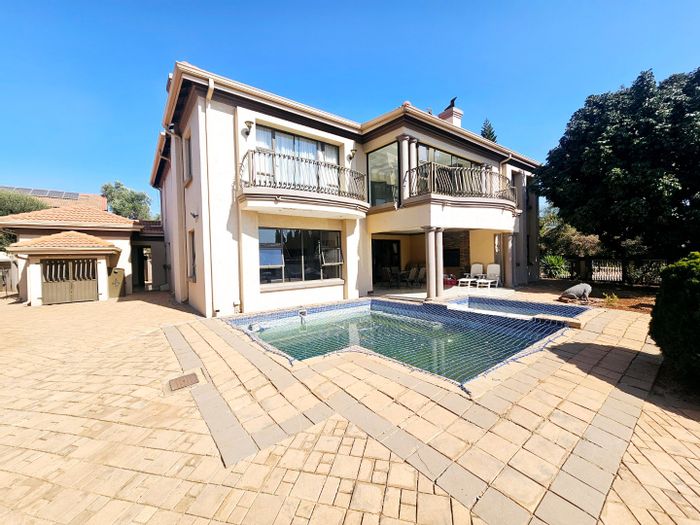 For Sale: Spacious 5-bedroom house with pool, garages, and scullery in Zambezi Country Estate.