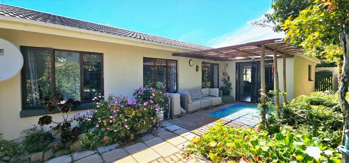 For Sale: Spacious Dana Bay house with expansive deck, braai area, and double carport.