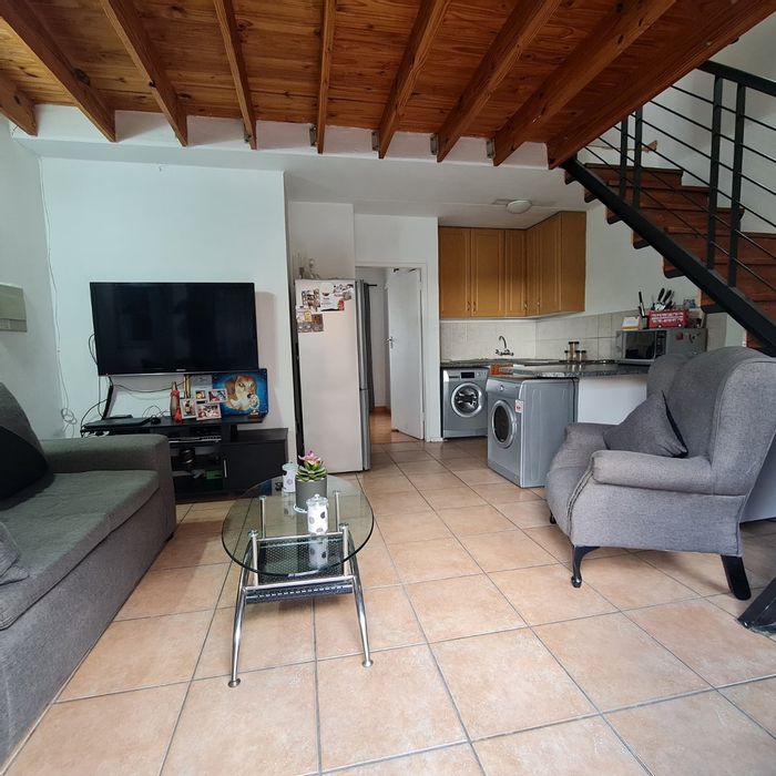 For Sale: Wilgeheuwel Townhouse with 2 ensuites, loft, garden, and garage.