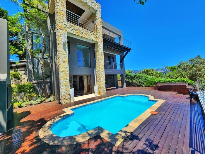 For Sale: House in Wilderness Central with 4 en suite bedrooms, pool, and ocean views.