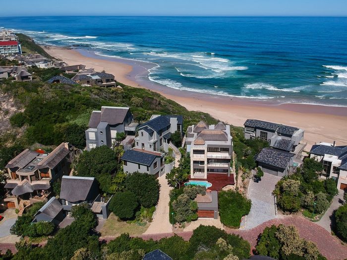 For Sale: House in Wilderness Central with 4 en suite bedrooms, pool, and ocean views.