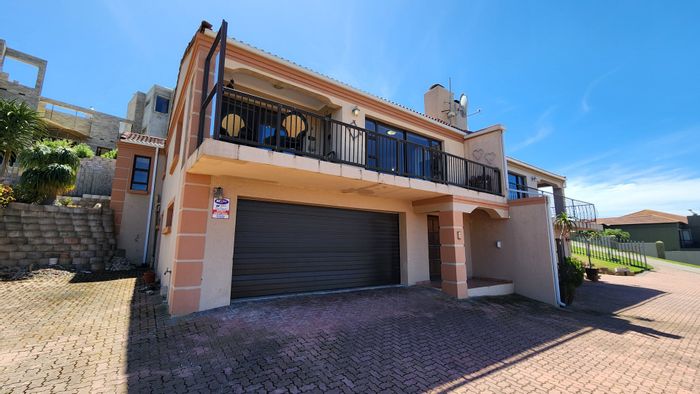 Island View House For Sale: Ocean views, double garage, open plan living, balcony.