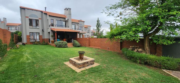 For Sale: Townhouse in Rietvlei Ridge Country Estate with garden, clubhouse, and pool.