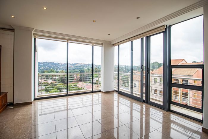 For Sale: Spacious 2-bedroom apartment in Bedford Gardens with wrap-around balcony and parking.