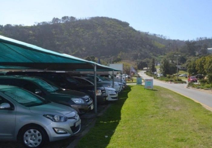 Commercial property for sale in Knysna Central with motor dealership and residential units.