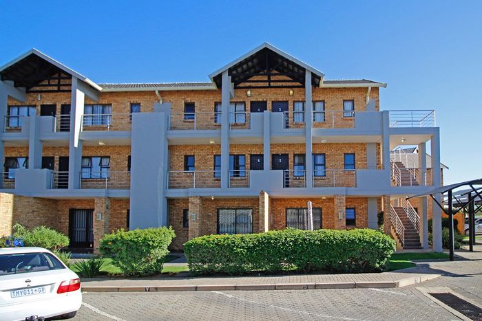 For Sale: Rooihuiskraal North Apartment with security, parking, and close to amenities.