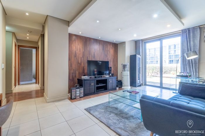 For Sale: Garden apartment in Bedford Gardens with 2 beds, secure parking, and concierge.