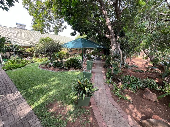 For Sale: Spacious Protea Park house with pool, garden, and entertainment areas.