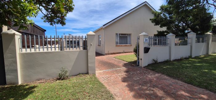 For Sale: House in Newton Park with spacious lounge, outbuildings, and remote access garden.