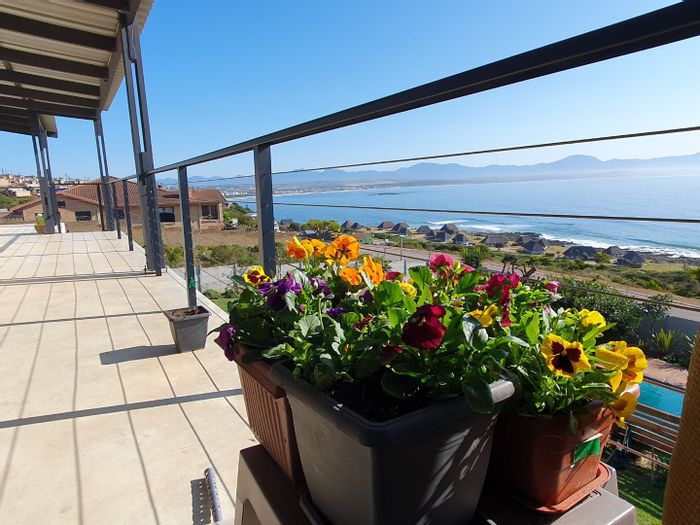 5 Bedroom House in De Bakke For Sale: Ocean views, rental potential, dual living spaces.