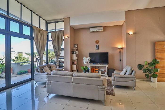 For Sale: 3-bedroom apartment in Bedfordview Central with balcony and mall access.