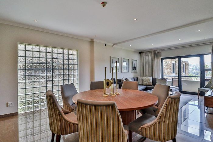 For Sale: Apartment in Bedfordview Central with 2 beds, balcony, and 24hr security.