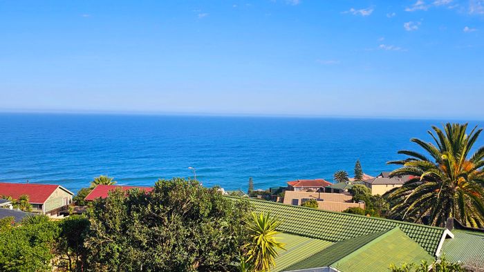 For Sale: Spacious Dana Bay house with sea views, multiple decks, and rental potential.