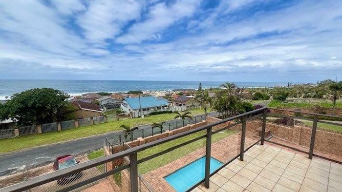 Uvongo House For Sale: 5 bedrooms, sea views, pool, secure parking, solar power.