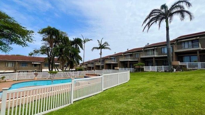 Uvongo Townhouse For Sale: 3 bedrooms, pool access, pet-friendly, near beach.