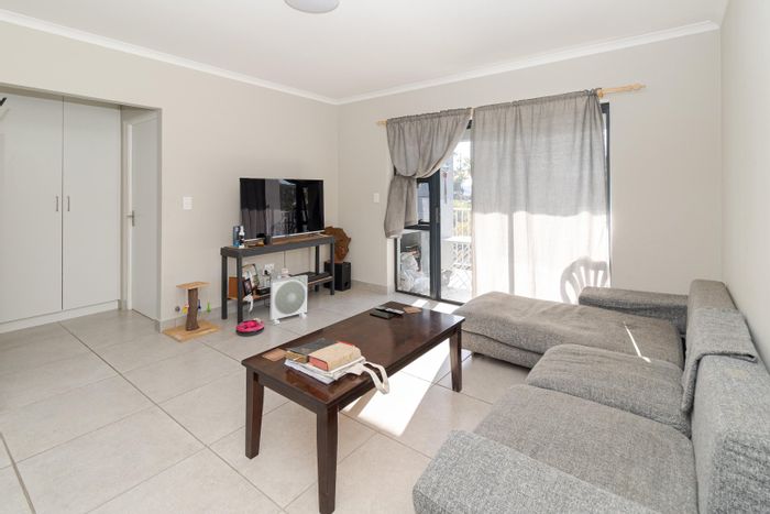 2-Bedroom Apartment For Sale in Protea Heights with balcony and secure parking.