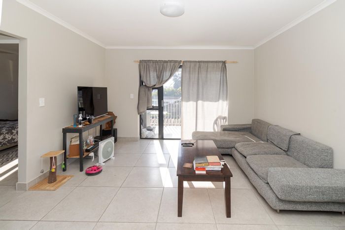 2-Bedroom Apartment for Sale in Protea Heights with Balcony and Secure Parking.