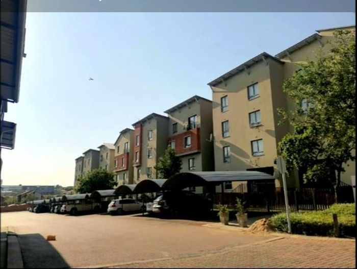 For Sale: Noordwyk Apartment with 2 beds, private garden, and secure complex access.