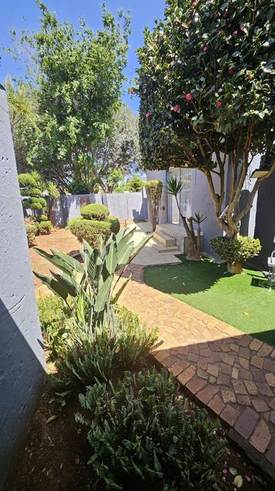 For Sale: House in Sophiatown with 4 beds, garden, flatlet, and secure parking.