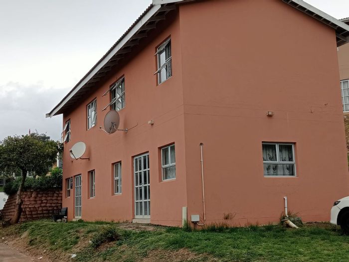 Newlands West House For Sale: Four duplex units, parking for five vehicles.