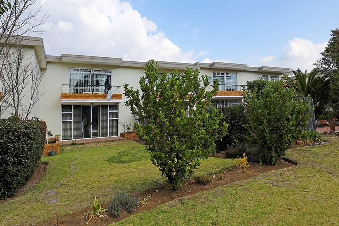 For Sale: Spacious Benoni South townhouse with study, double garages, and park access.