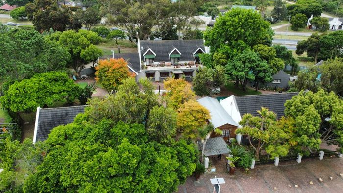 Commercial property for sale in The Village with restaurant, self-catering units, and pool.