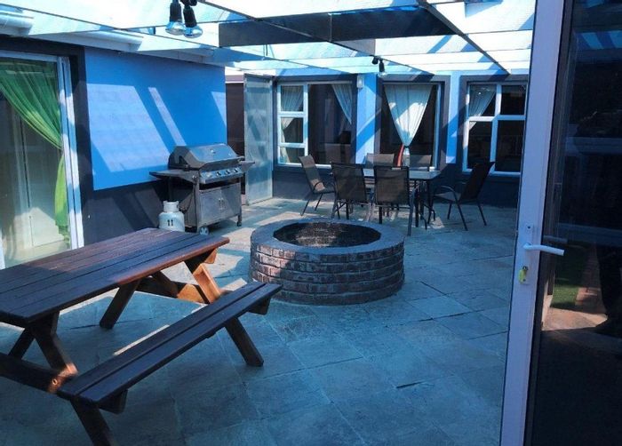 Wavecrest House For Sale: Eight bedrooms, courtyard, double garage, and scenic deck.