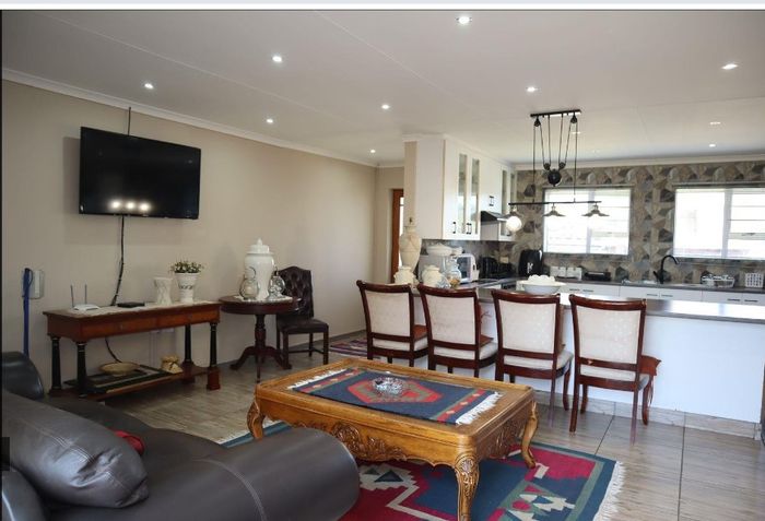 Noorsekloof House For Sale: Open-plan living, garden patio, double garage conversion.