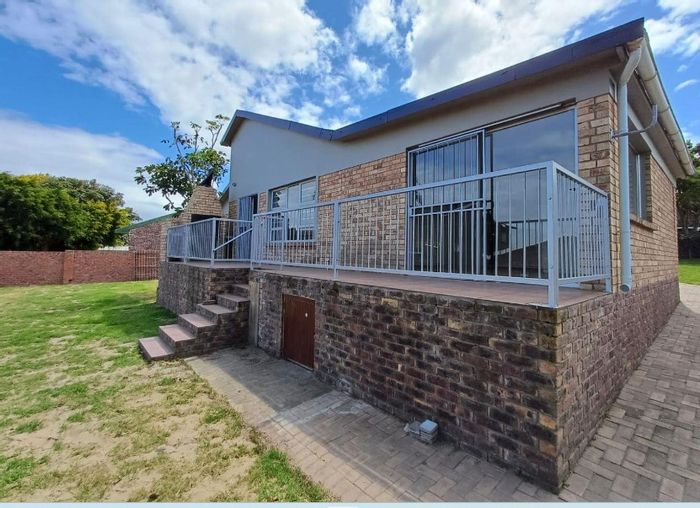 Wavecrest House For Sale: Enclosed garden, open-plan living, double garage, braai patio.