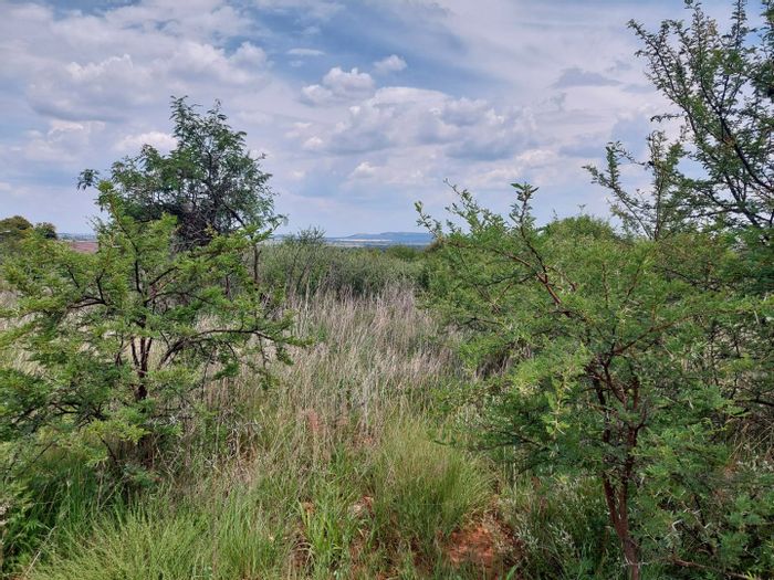 Vacant Land Residential For Sale in Hartbeesfontein with municipal services and views.