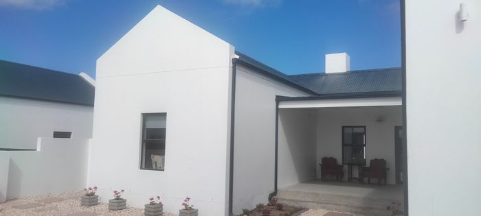 Coastal house for sale in Atlantic Sands: spacious, garage, garden, braai area.