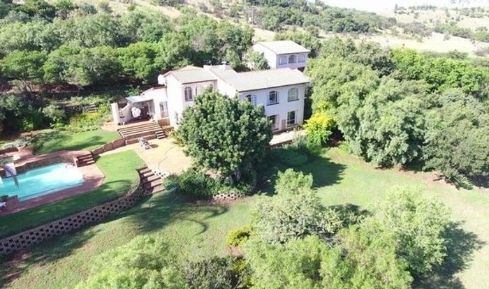 Riverside Estate Farm For Sale: 9-bedroom guesthouse, off-grid, game-rich environment.