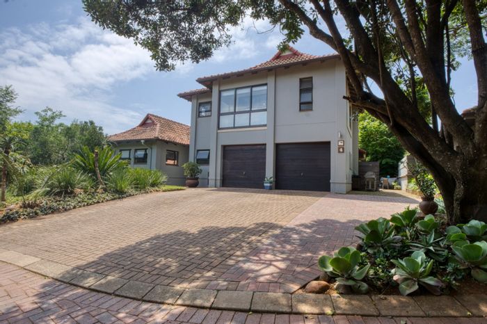 For Sale: House in Port Zimbali Estate with pool, entertainment area, and studies.