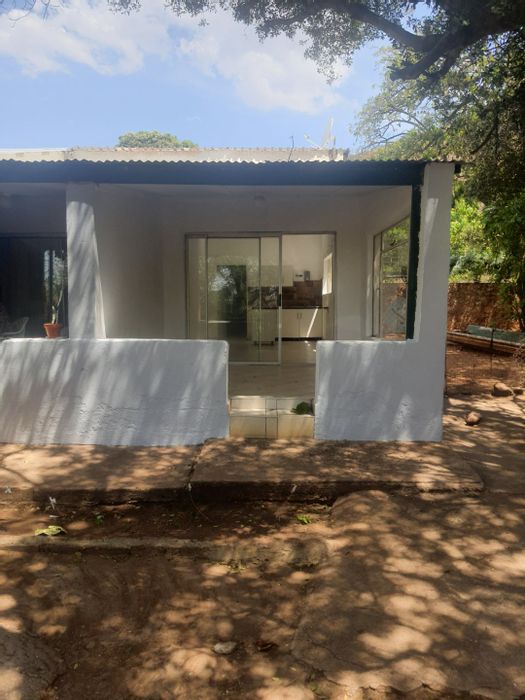 1-Bedroom Apartment To Rent in Hartbeespoort Rural with secure parking and communal areas.
