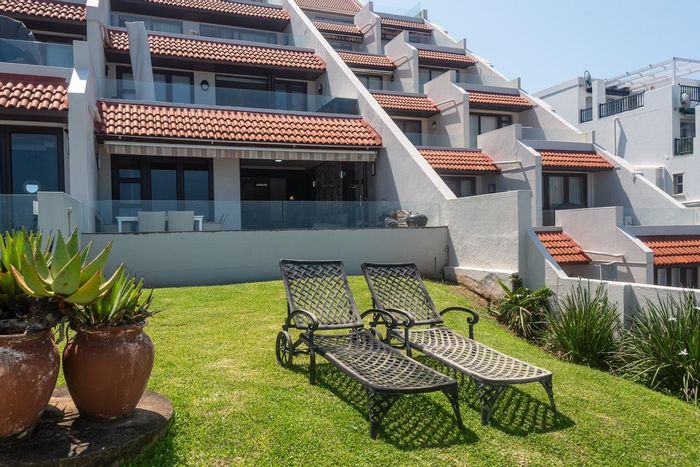 Coastal apartment in Shakas Rock with beach access, security, and ocean views. For Sale.