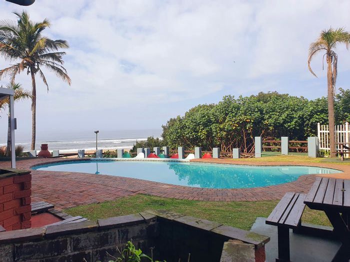 For Sale: Apartment in Manaba Beach with beach access, pool, and games room.