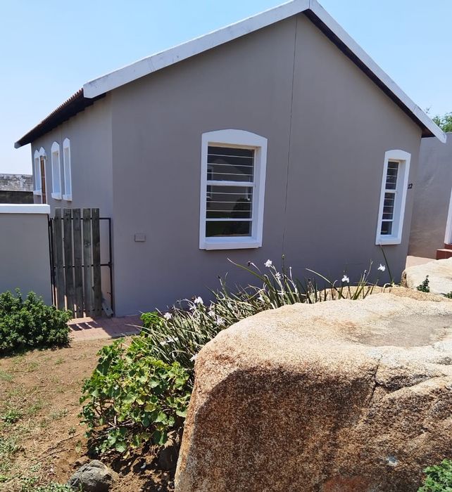 House for Sale in Brits Central: 2 beds, 1.5 baths, secure estate living.