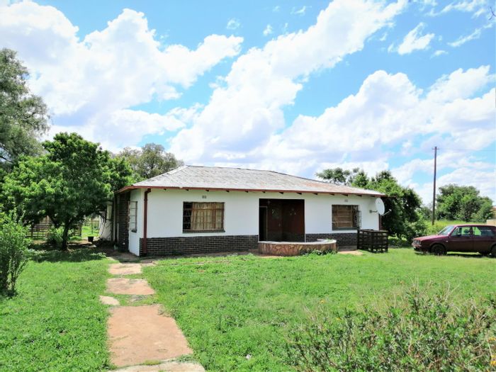 Commercial Property For Sale in Rosashof: Includes garages, boreholes, and potential flatlet.