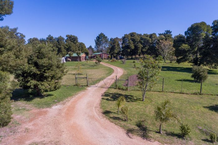 Farm for Sale in Harkerville AH: Income-generating cottages, dams, and unique elephant views.