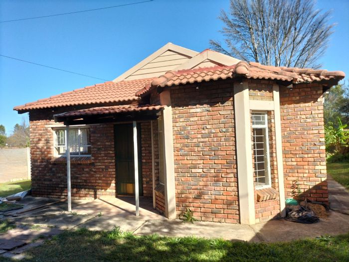 3 Bedroom House in Orkney Central with garage, garden, and security features. For Sale.