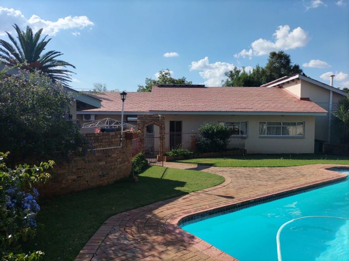 Spacious 4-bedroom house in Wilkoppies with office, pool, and solar system. For Sale.