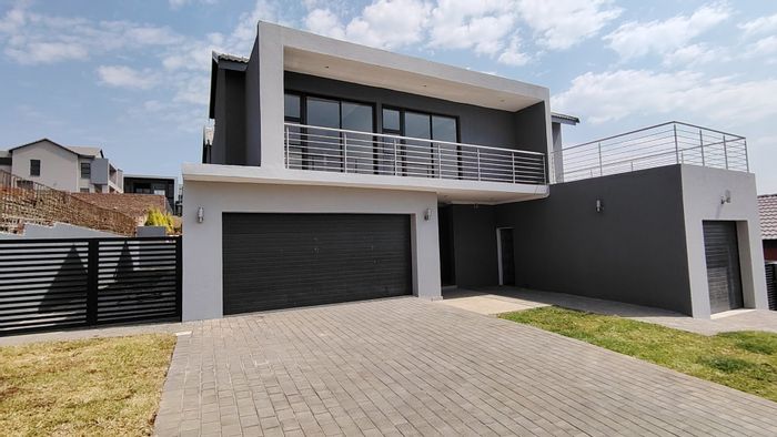 For Sale: House in Eldo Village Estate with 4 bedrooms, garages, and entertainment area.