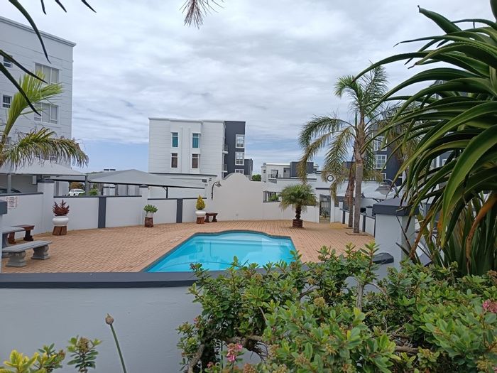 For Sale: 3-Bedroom Apartment in Reebok with Pool, Garage, and Beach Access.