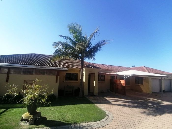 For Sale: House in Hartenbos Heuwels with 4 beds, double garage, and yard space.