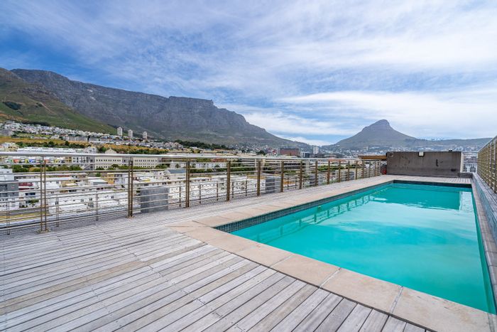 Zonnebloem Apartment For Sale: 2 bedrooms, balcony, pool, city views, investment potential.