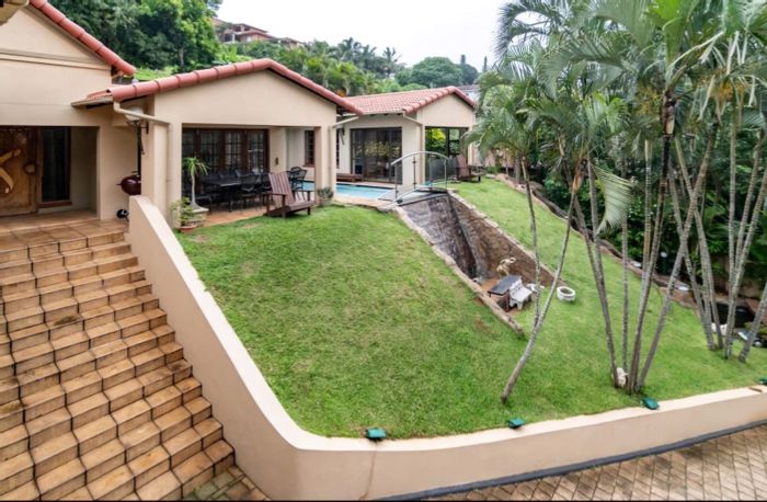 For Sale: Spacious 5-bedroom house in Ballitoville with pool, flat, and security.